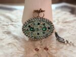 Turkish Emerald Oval Handcrafted Clutch with Crystal & Golden Leaf Embellished Design